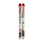 skis with a continuous image of a person riding a motorcycle and a Sasquatch inspired Rainier beer in the background