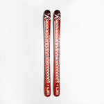 Two red skis with Rainer x LIB